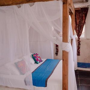 Zimmer mit Kingsize-Bett und mit Strandblick